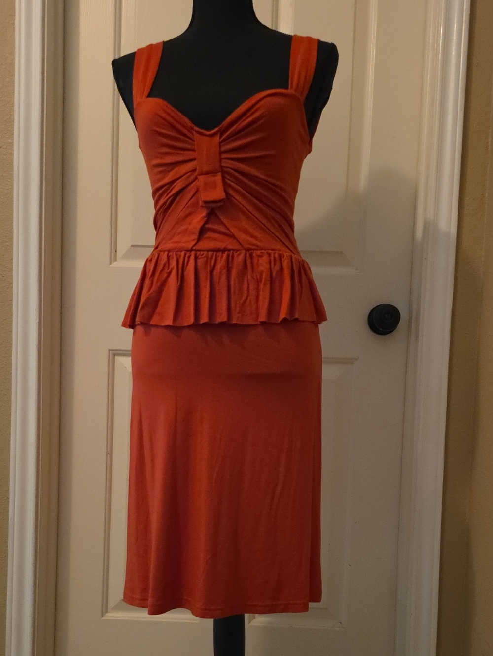 Made In BALI Sleeveless Rust Peplum Midi Dress with Gathered Bow Front